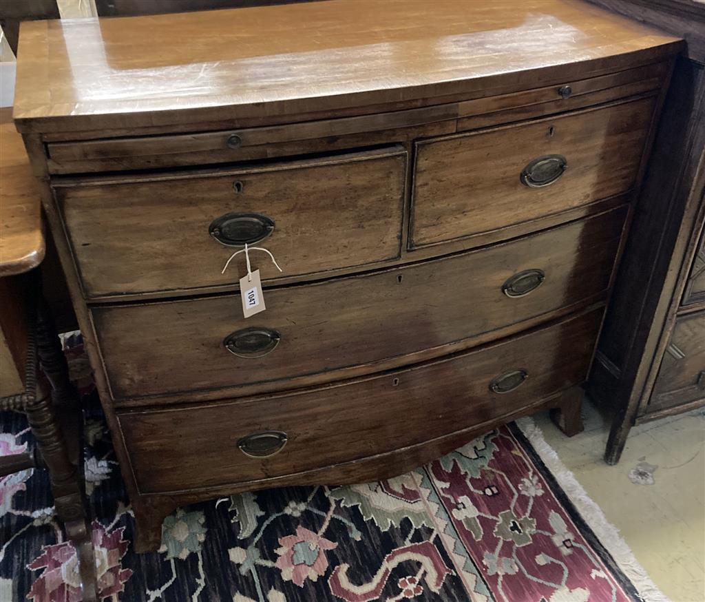 A Regency mahogany bowfront chest, fitted brushing slide, width 96cm, depth 49cm, height 86cm